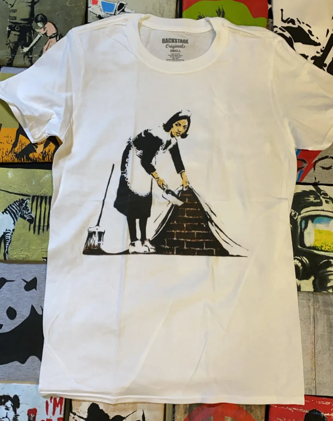 Banksy T-shirt - Sweep It Under The Carpet Maid